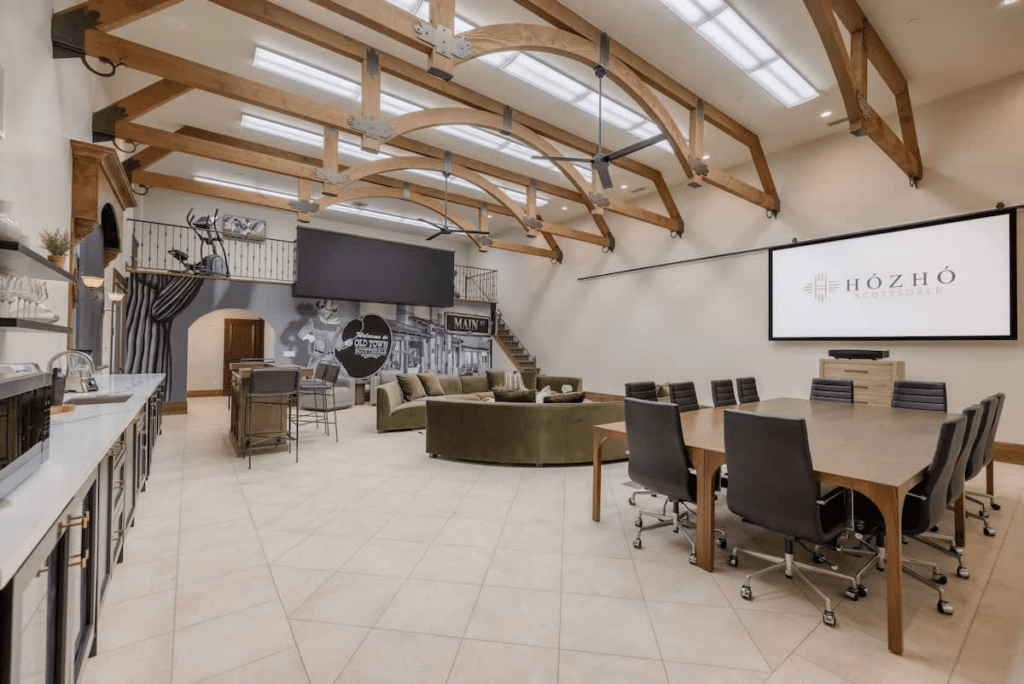 An image of the inside of a luxury residence rental equppied with meeting amenities. 