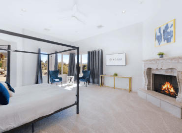 Image of one of the guest bedrooms at HÓZHÓ East Estate at Lone Mountain.