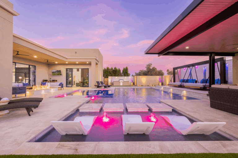 A beautiful vacation rental with a quiet ambiance around a pool. 