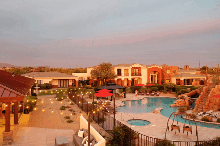 The HÓZHÓ Main Estate is a luxury 8-bedroom Scottsdale retreat with resort-style amenities and upscale indoor features.