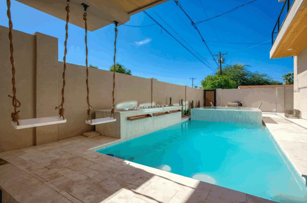 Retro-style private pool and patio at HÓZHÓ Old Town Coolidge for fun, walkable bachelorette weekends.