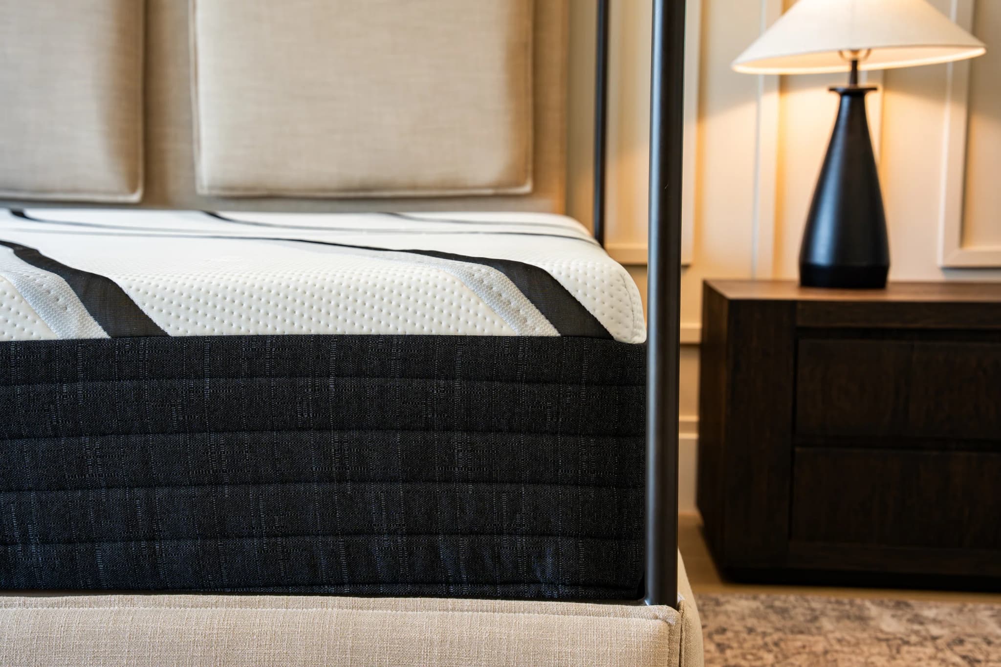 Close view of a HÓZHÓ Scottsdale mattress in a luxury bedroom.