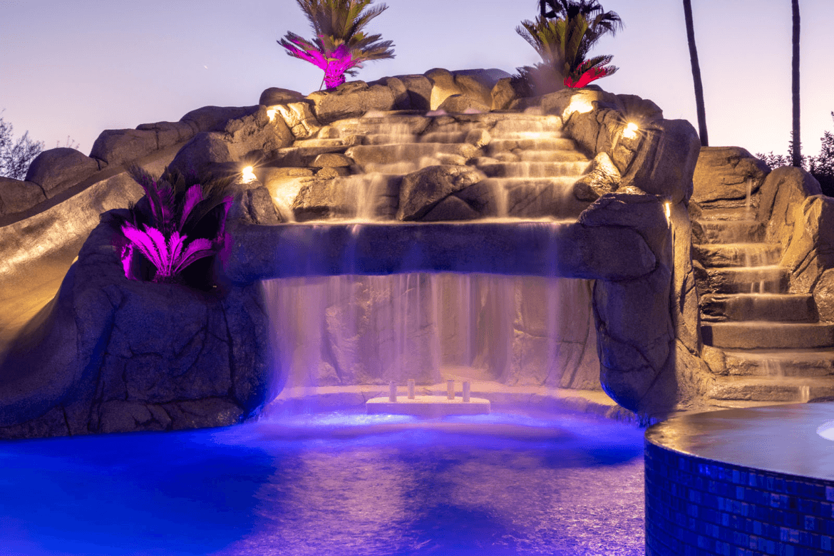 A secluded grotto illuminated in the evening.