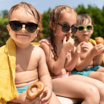 Kids enjoying the pool and a snack during Scottsdale spring break.