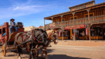 An image of an old west town with horse and buggy.