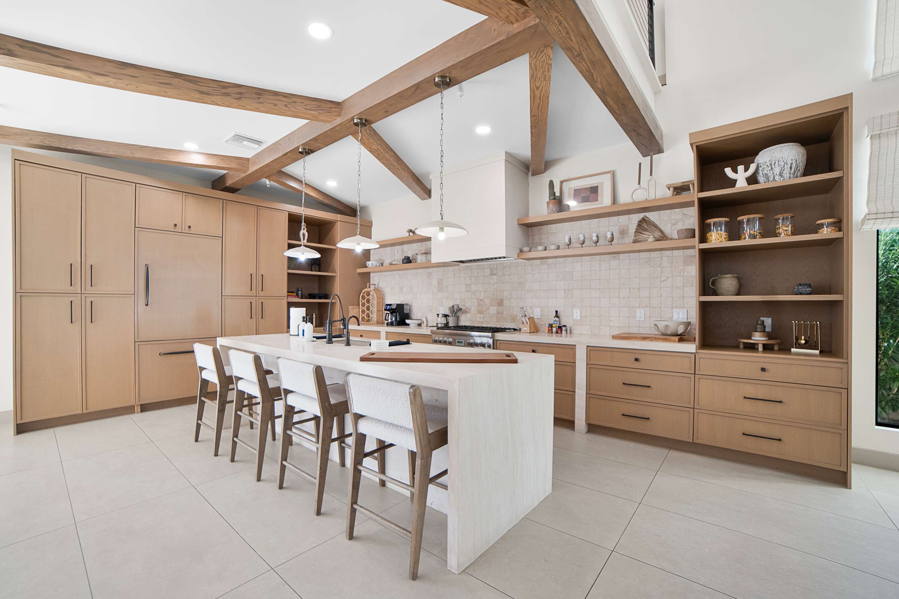 Spacious chef's kitchen with premium appliances, a large island, and everything you need for effortless meals and entertaining.