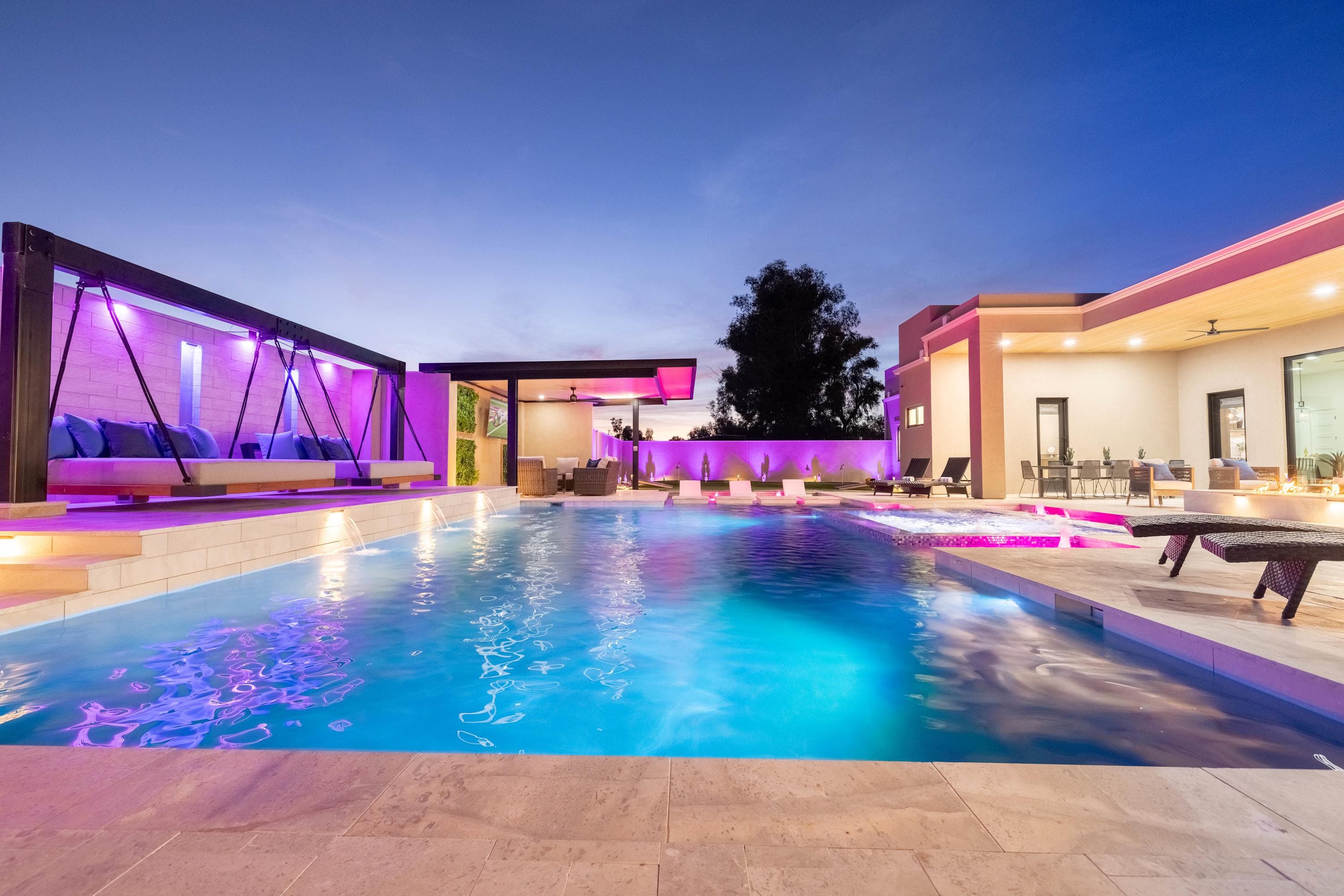 End the day with a peaceful swim beneath beautiful skies and glowing lights.