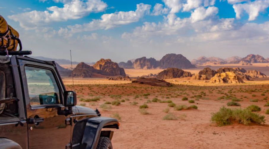 An image of a Jeep in the desert.