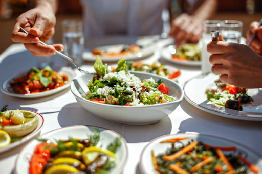 An image of a table full of various healthy dishes