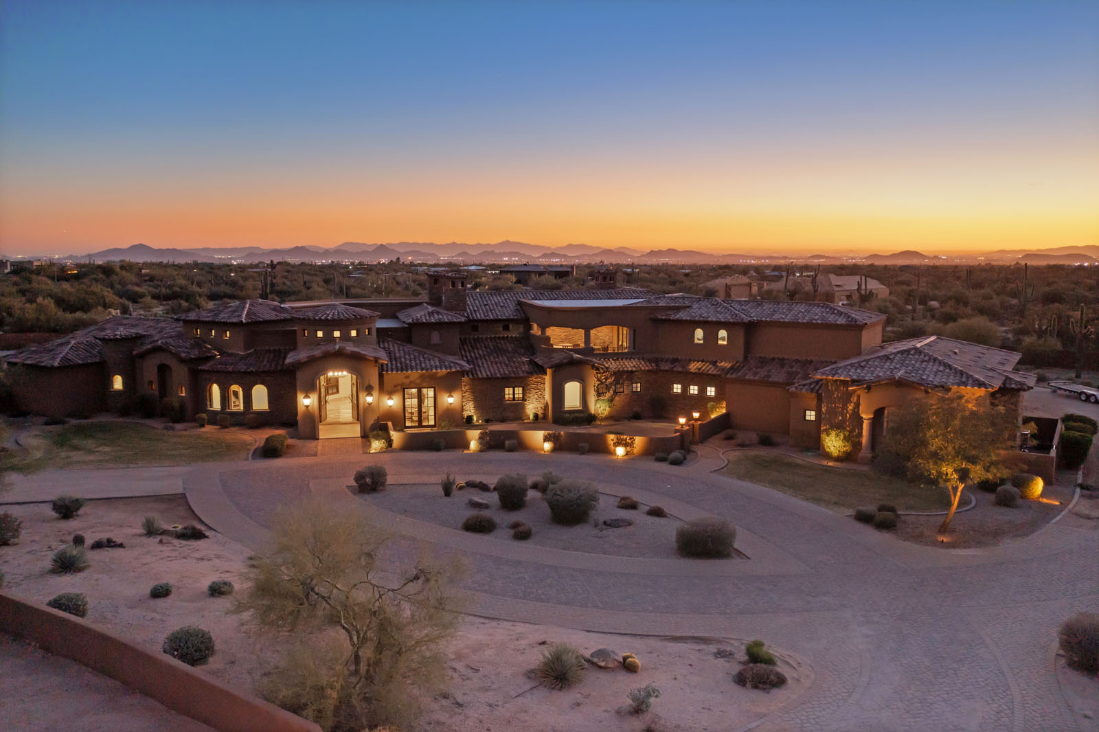 Drone image of the front of the HÓZHÓ West Estate at Lone Mountain.