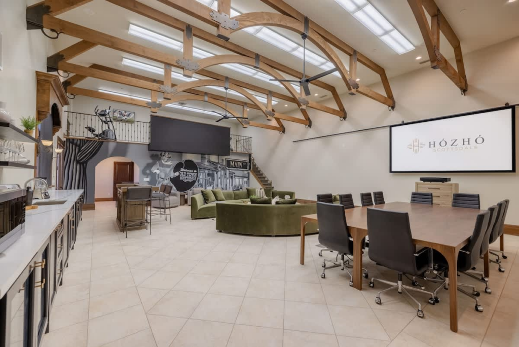 An image of the inside of a luxury residence rental equppied with meeting amenities. 