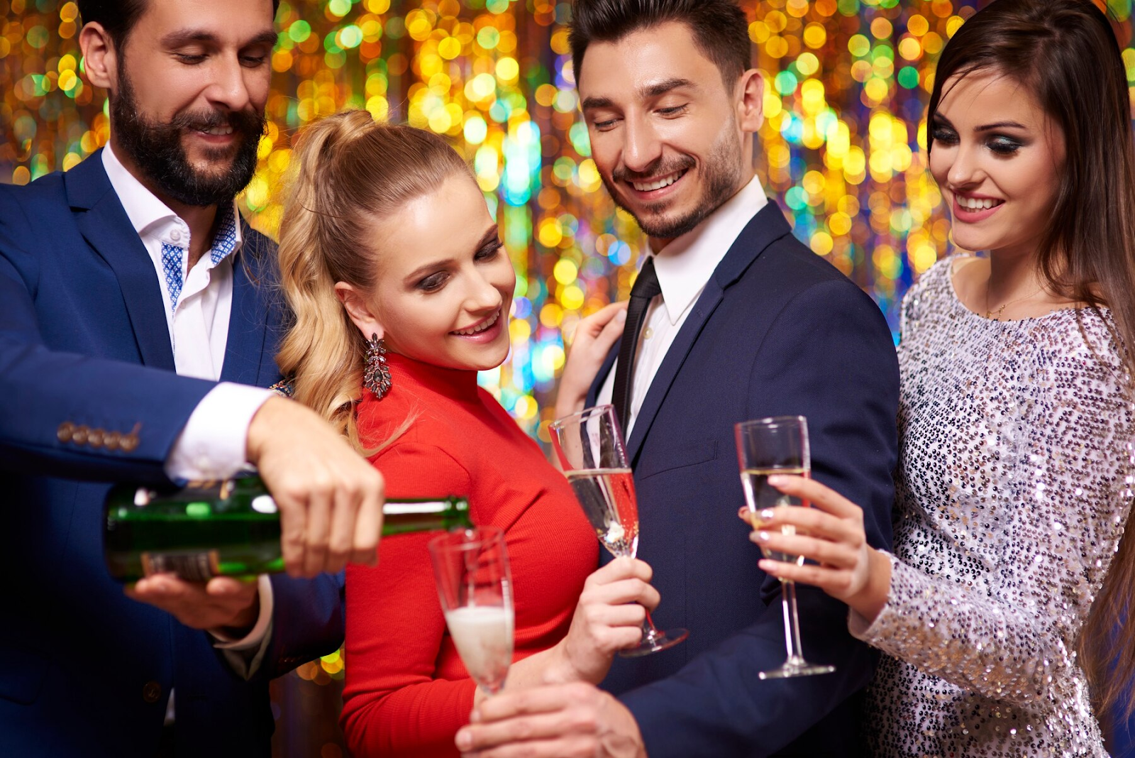 A group of people celebrate at a party. 