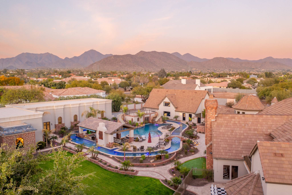 Exterior drone image of HÓZHÓ Grand Estate on Sunnyside.