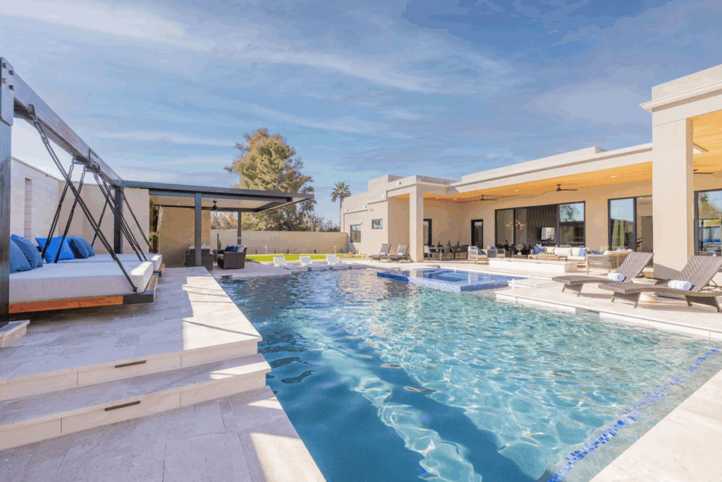 The heated pool, spa, and lounge create the perfect outdoor retreat.