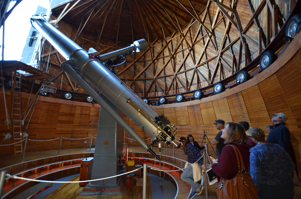 An image of people stargazing at Lowell Observatory in Flagstaff. 