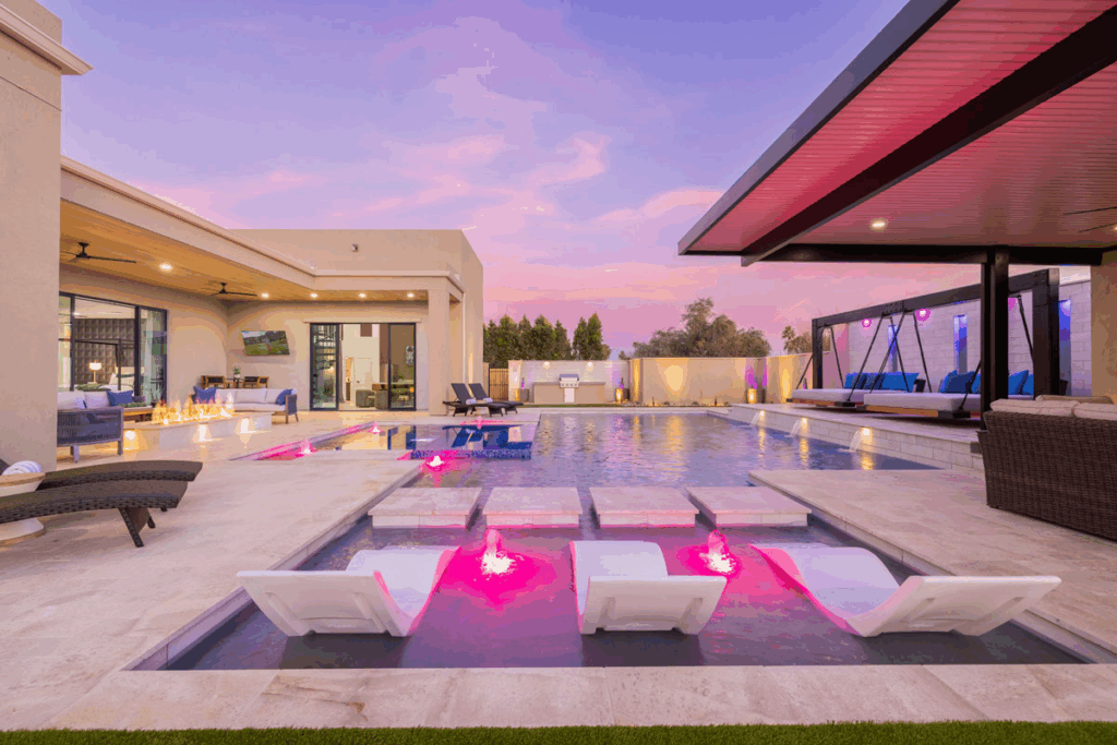 A beautiful vacation rental with a quiet ambiance around a pool. 