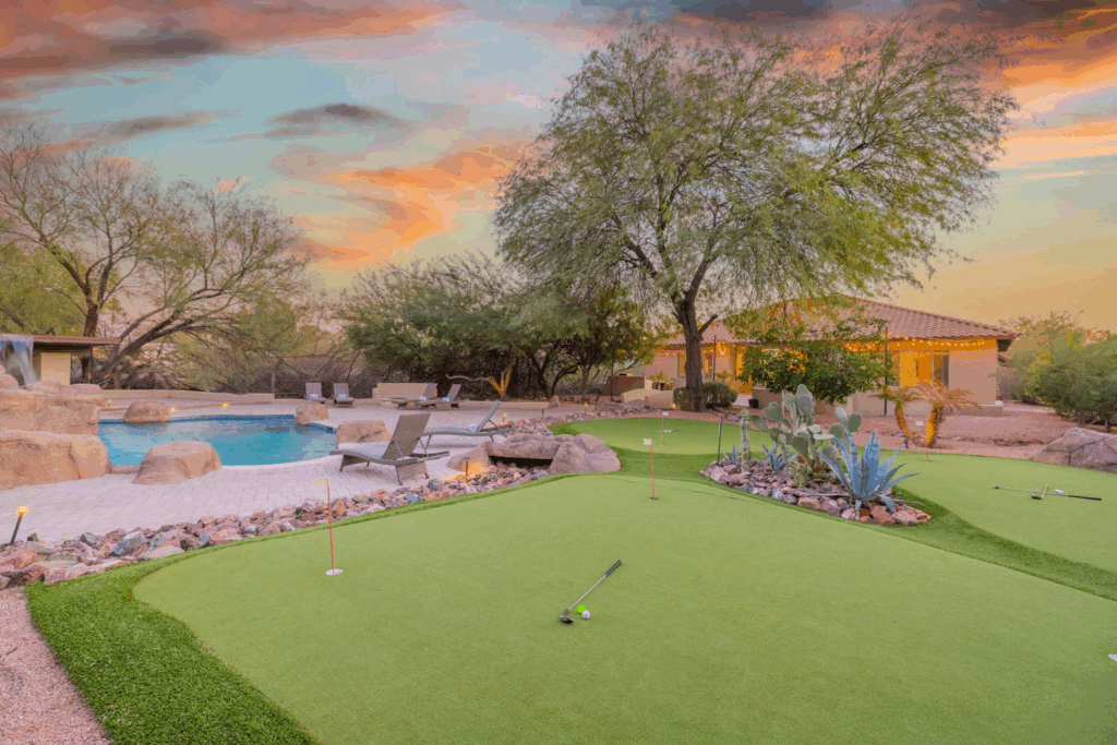 Desert oasis with pool and mini golf green.