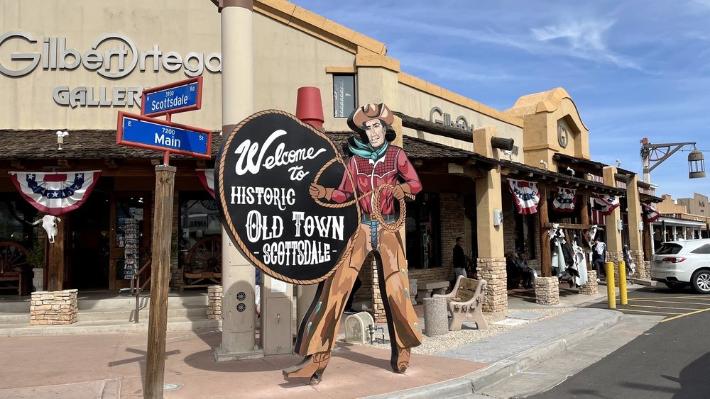 Historic Western storefronts and wooden sidewalks in Old Town Scottsdale’s historic district.