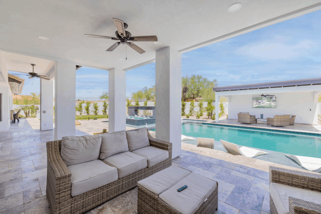 A romantic villa getaway with outdoor seating and a pool. 